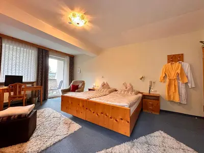 Ein Bett oder Betten in einem Zimmer der Unterkunft Pension zum Löwen, Parkplatz, Wlan, Zentral