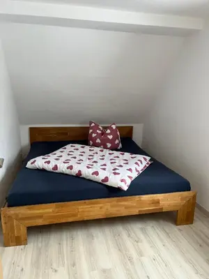 Ein Bett oder Betten in einem Zimmer der Unterkunft Apartment Engelstädter