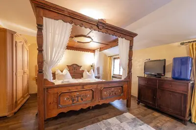 Ein Bett oder Betten in einem Zimmer der Unterkunft Landhotel Gasthof Stern