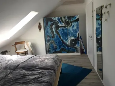 Ein Bett oder Betten in einem Zimmer der Unterkunft Apartment Götterdämmerung
