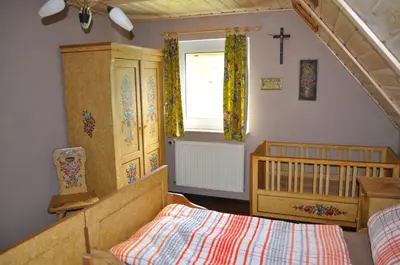 Ein Bett oder Betten in einem Zimmer der Unterkunft Ferienhaus Müller