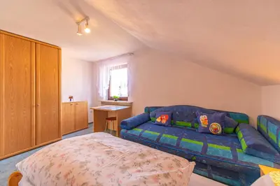 Ein Bett oder Betten in einem Zimmer der Unterkunft Ferienwohnung Werner