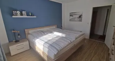 Ein Bett oder Betten in einem Zimmer der Unterkunft Ferienwohnung Sendelbeck