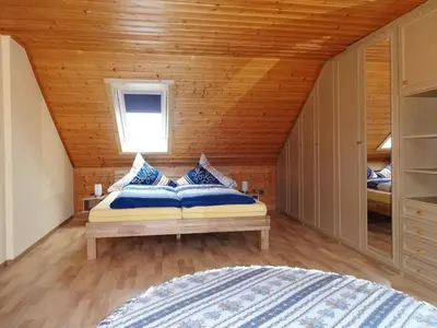 Ein Bett oder Betten in einem Zimmer der Unterkunft Ferienwohnungen Schallerhof