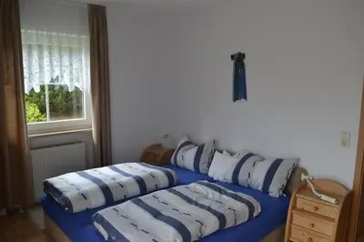 Ein Bett oder Betten in einem Zimmer der Unterkunft Haus Cäcilia