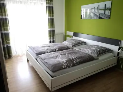 Ein Bett oder Betten in einem Zimmer der Unterkunft Ferienwohnung-Kappl