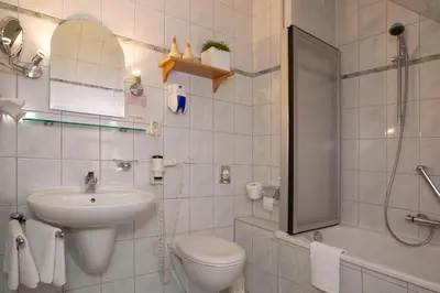 Ein Badezimmer in der Unterkunft Hotel Heinz