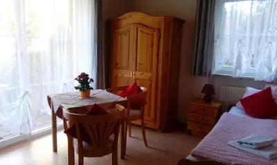 Ein Bett oder Betten in einem Zimmer der Unterkunft Ferienwohnung Hopfennest