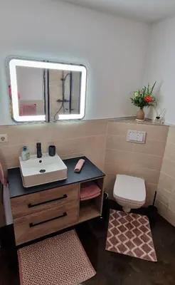 Ein Badezimmer in der Unterkunft Ferienwohnungen 