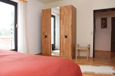 Ein Bett oder Betten in einem Zimmer der Unterkunft Ferienwohnung Wölfel