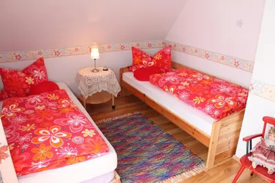 Ein Bett oder Betten in einem Zimmer der Unterkunft Ferienwohnung Wölfel