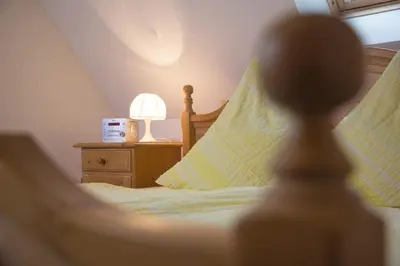 Ein Bett oder Betten in einem Zimmer der Unterkunft Ferienwohnung Am Sonnenhang