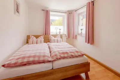Ein Bett oder Betten in einem Zimmer der Unterkunft Haus Florian