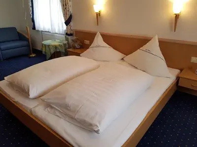 Ein Bett oder Betten in einem Zimmer der Unterkunft Gasthof Pension Walther