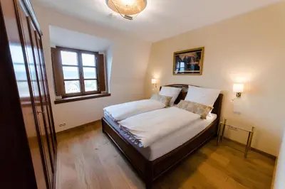 Ein Bett oder Betten in einem Zimmer der Unterkunft Ferienwohnung am Blasturm