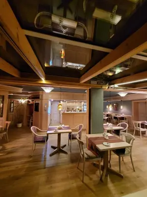 Ein Sitzbereich in der Unterkunft Ambiente Hotel garni