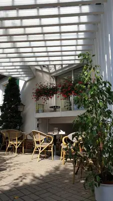 Ein Restaurant oder anderes Speiselokal in der Unterkunft Ambiente Hotel garni