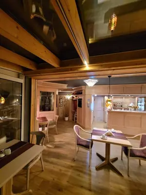 Ein Sitzbereich in der Unterkunft Ambiente Hotel garni
