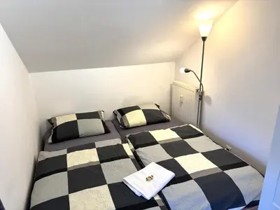 Ein Bett oder Betten in einem Zimmer der Unterkunft Luxuriöse Ferienwohnung 