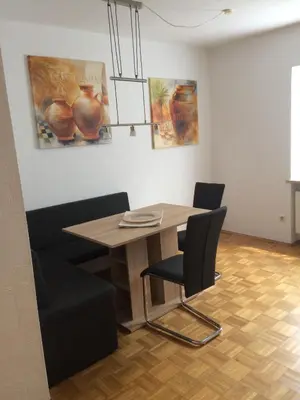 Ein Sitzbereich in der Unterkunft Ferienwohnung Im Grünen