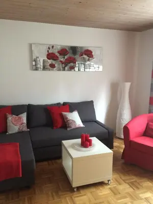 Ein Sitzbereich in der Unterkunft Ferienwohnung Im Grünen