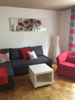 Ein Sitzbereich in der Unterkunft Ferienwohnung Im Grünen