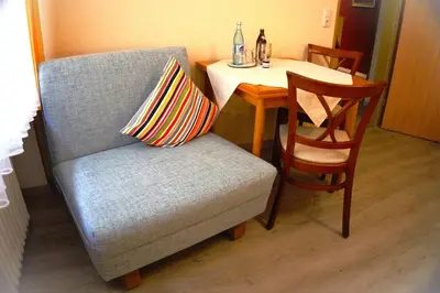 Ein Sitzbereich in der Unterkunft Gasthof zum Löwen
