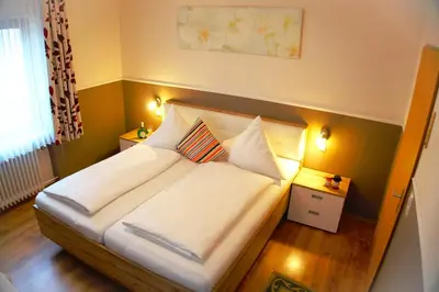 Ein Bett oder Betten in einem Zimmer der Unterkunft Gasthof zum Löwen