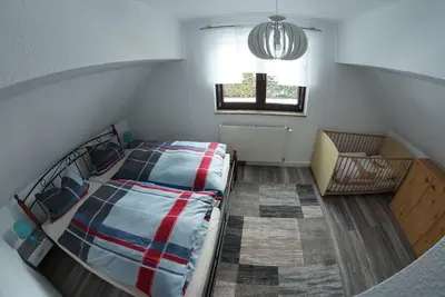 Ein Bett oder Betten in einem Zimmer der Unterkunft Ferienhaus Familie Lorenz