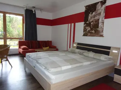 Ein Bett oder Betten in einem Zimmer der Unterkunft Gästehaus Sonneck