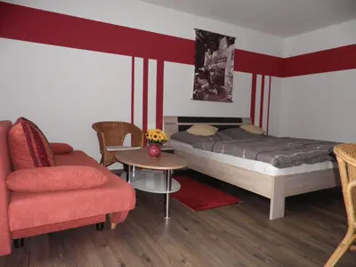 Ein Bett oder Betten in einem Zimmer der Unterkunft Gästehaus Sonneck