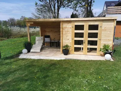 Ein Garten an der Unterkunft Ferienwohnung Bergwiese