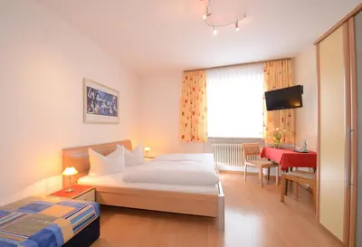 Ein Bett oder Betten in einem Zimmer der Unterkunft Gasthof zur Post Hotel und Parkplatz