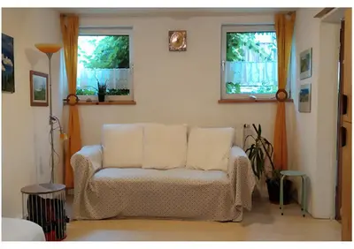 Ein Sitzbereich in der Unterkunft Ferienwohnung Langenstadt