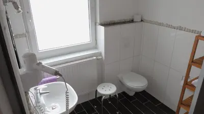 Ein Badezimmer in der Unterkunft Hotel-Gasthof Wilder Mann