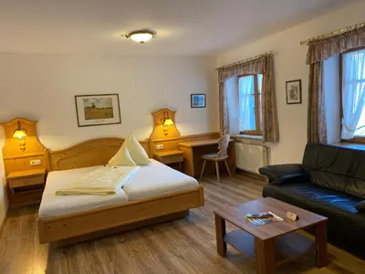 Ein Bett oder Betten in einem Zimmer der Unterkunft Hotel Lobmeyer
