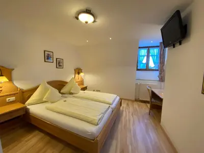 Ein Bett oder Betten in einem Zimmer der Unterkunft Hotel Lobmeyer