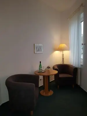 Ein Sitzbereich in der Unterkunft Pension Nadia