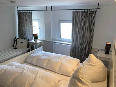 Ein Bett oder Betten in einem Zimmer der Unterkunft Ferienhaus im Fichtelgebirge