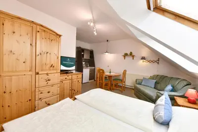 Ein Bett oder Betten in einem Zimmer der Unterkunft Landhotel Jungbrunnen