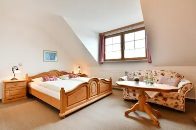 Ein Bett oder Betten in einem Zimmer der Unterkunft Landhotel Jungbrunnen
