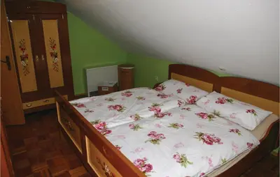 Ein Bett oder Betten in einem Zimmer der Unterkunft Beautiful Home In Lengenfeldplohn