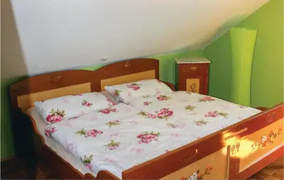 Ein Bett oder Betten in einem Zimmer der Unterkunft Beautiful Home In Lengenfeldplohn