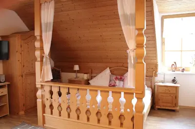 Ein Bett oder Betten in einem Zimmer der Unterkunft Gästehaus Sporrer