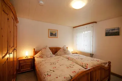 Ein Bett oder Betten in einem Zimmer der Unterkunft Ferienwohnungen Neuner