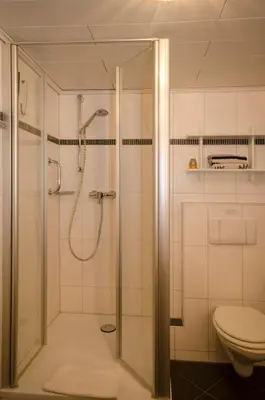 Ein Badezimmer in der Unterkunft Ferienwohnungen Neuner