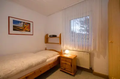 Ein Bett oder Betten in einem Zimmer der Unterkunft Ferienwohnungen Neuner