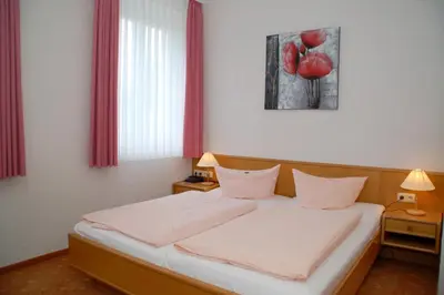 Ein Bett oder Betten in einem Zimmer der Unterkunft Hotel Goldner Anker