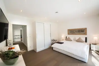Ein Bett oder Betten in einem Zimmer der Unterkunft View & Garden Villa Schauenstein