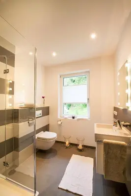 Ein Badezimmer in der Unterkunft View & Garden Villa Schauenstein